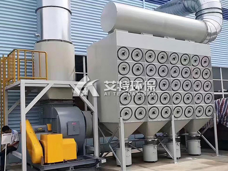 Inclined cartridge dust collector